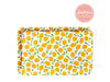 Our melamine tray with a repeating pattern of lemons, the FabFitFun box partner logo above it