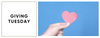 Stock image of hand holding a pink heart against a blue background