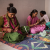 Image of women sewing.